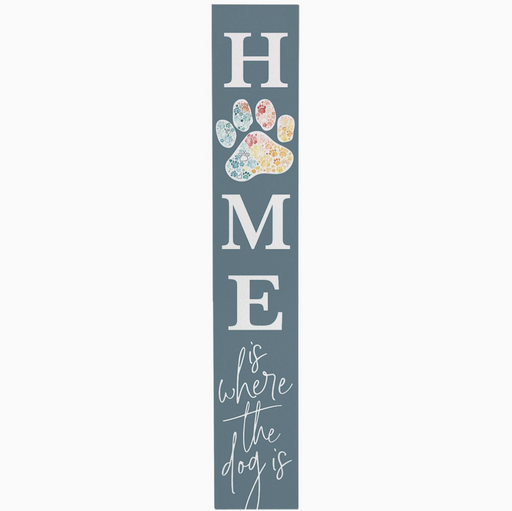 Decorative sign with 'HOME is where the dog is' text and a colorful paw print on a blue background.