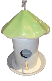 Birdhouse with a green roof and gray body on a white background