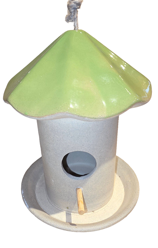 Birdhouse with a green roof and gray body on a white background