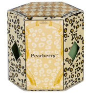 A green Tyler Candle Company jar candle with a decorative lid featuring a leopard print design.