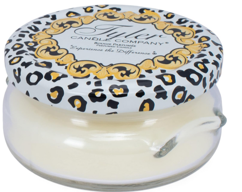 Jar candle with decorative lid featuring 'Tyler Candle Company' branding on a white background