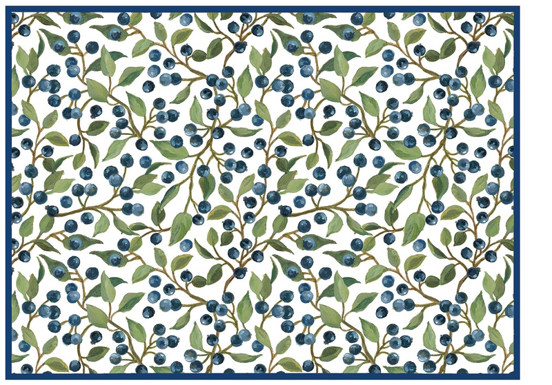A kitchen drying mat featuring a blue and white color scheme with a leaf and berry pattern.