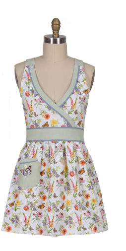 Floral apron on a mannequin with a white background