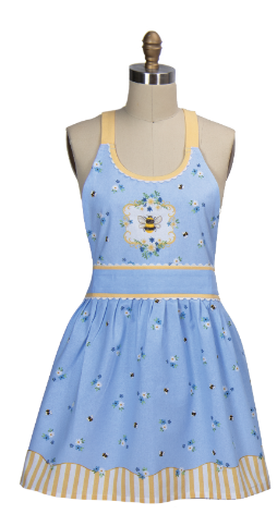 Blue apron with floral and bee pattern on a mannequin against a white background