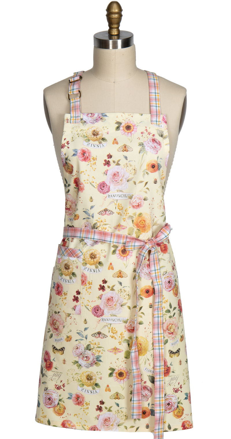 Floral apron on a mannequin with a white background