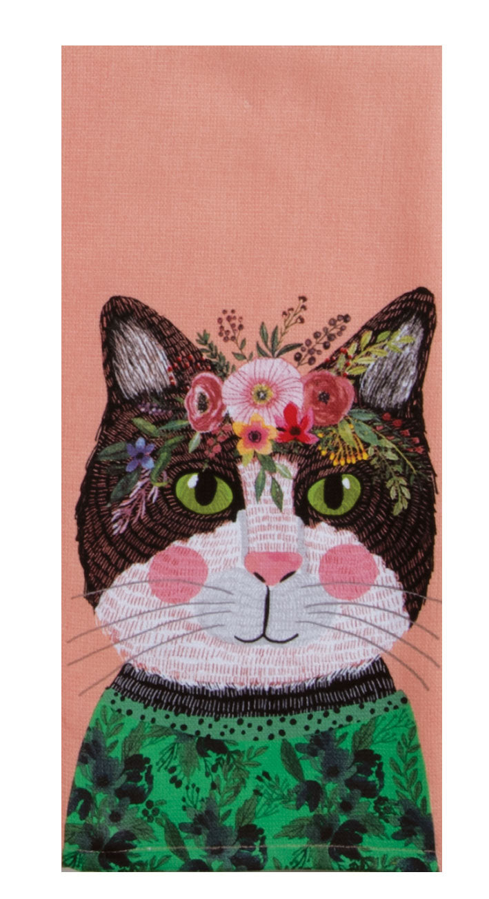 Embroidered cat design with floral headband and green dress on a pink background