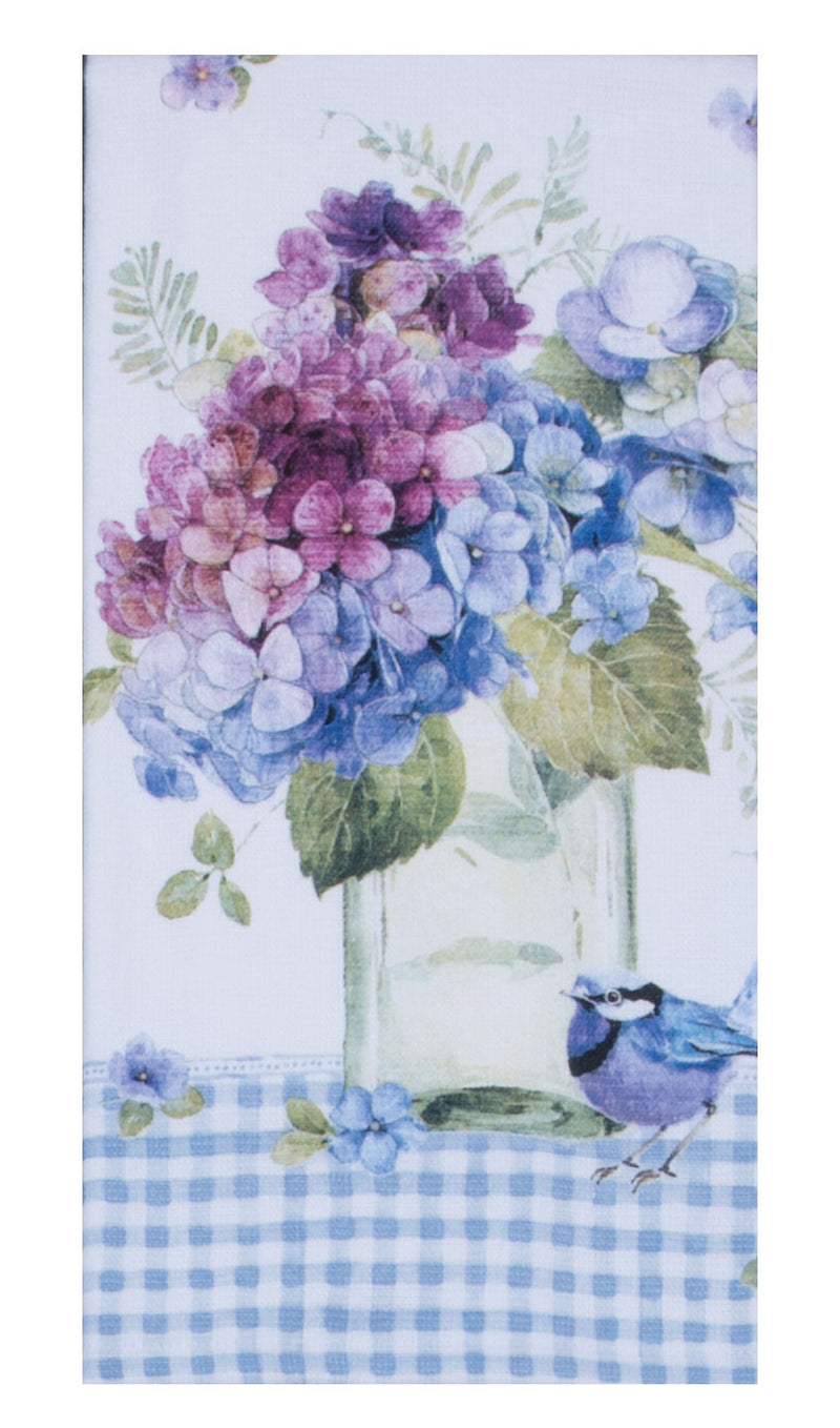 Decorative kitchen towel with floral design and bluebirds on a checkered border