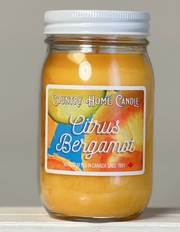 Jar of Country Home Candle Citrus Bergamot candle on a neutral background