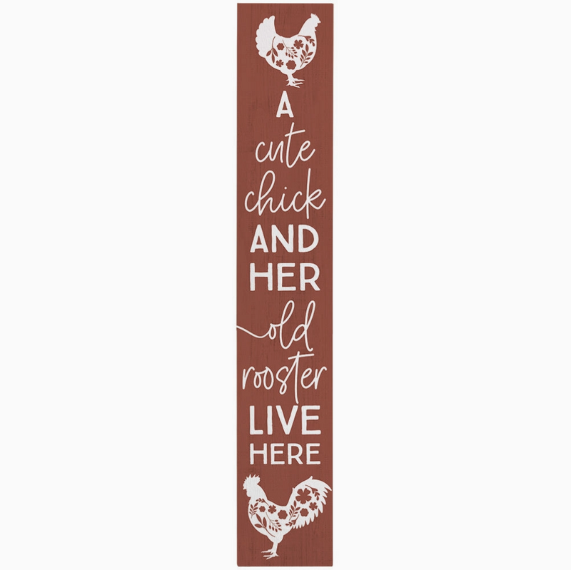 Decorative sign with rooster illustrations and text on a brown background