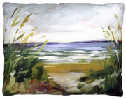Decorative pillow with a landscape painting of a field and sky.