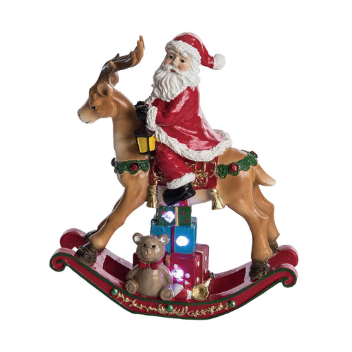 Decorative figure of Santa Claus riding a reindeer with toys on a white background