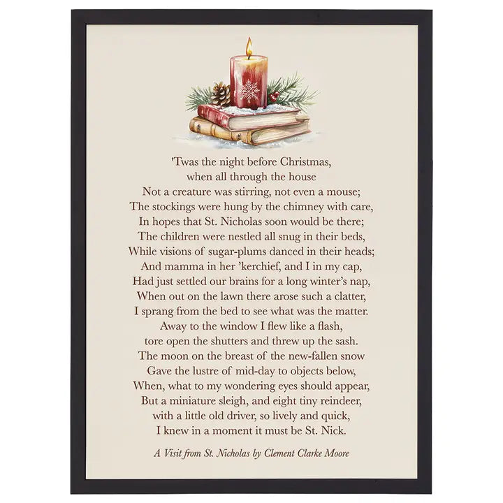 A framed Christmas-themed art print featuring a poem titled 'Twas the night before Christmas' with a warm illustration of a lit candle, wrapped gifts, and pinecones at the top, and the text 'A Visit from St. Nicholas by Clement Clarke Moore' at the bottom.