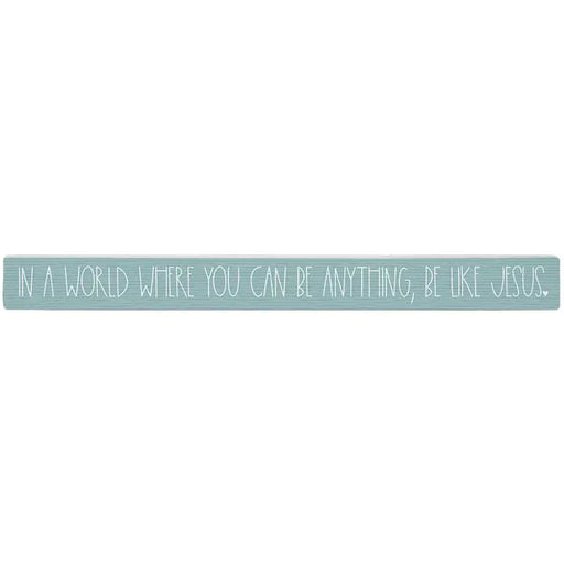 Motivational quote 'In a world where you can be anything, be like Jesus' on a light blue background