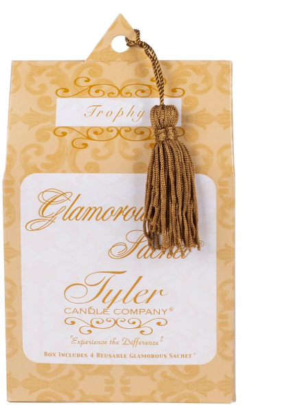 Glamorous Sachet packaging from Tyler Candle Company with decorative tassel on a white background