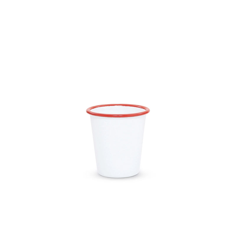 White cup with red rim on a white background