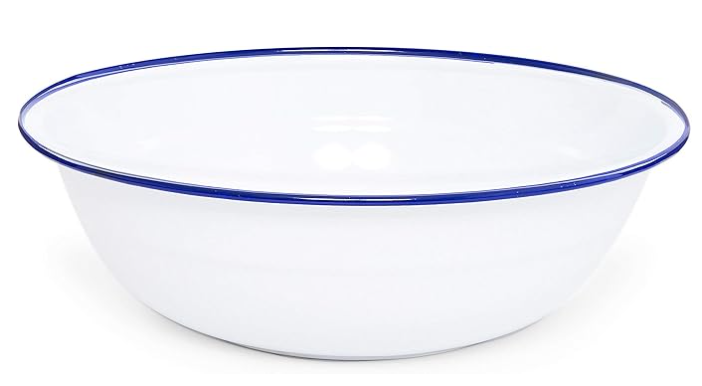 A medium-sized round enamel basin with a blue and white marbled pattern.
