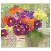 Calendar cover with colorful flowers and Judy Buswell's signature, featuring a watercolor style.