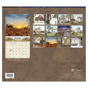 Calendar with scenic illustrations of houses and landscapes on a brown background, featuring the brand 'Legacy'.