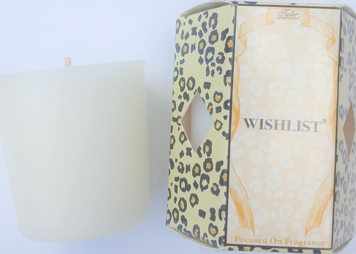 A beige candle with a leopard print pattern on the packaging, labeled 'Wishlist' and 'focused on fragrance'.