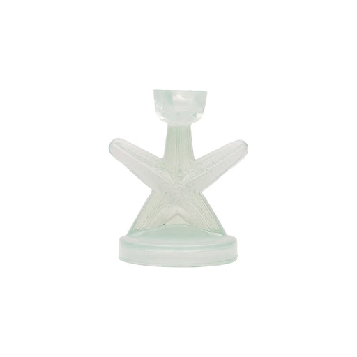 Decorative lamp with starfish design on a white background