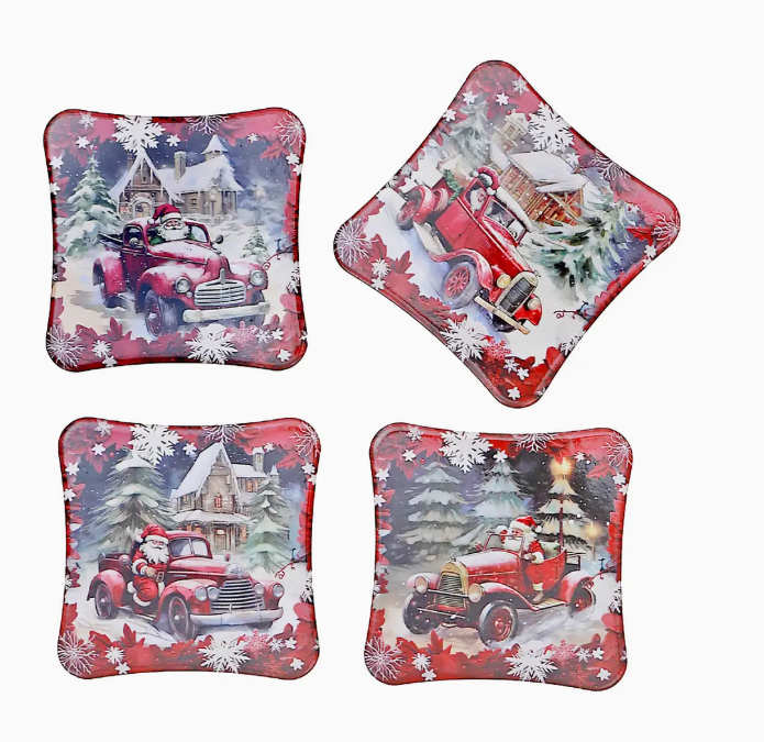 Set of four Christmas-themed coasters with vintage red trucks and Santa Claus on a white background.