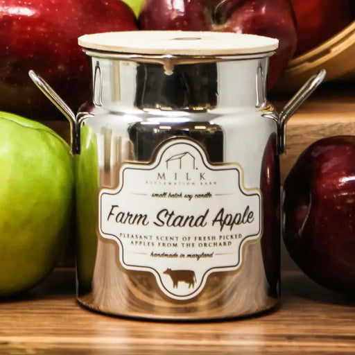 Candle labeled 'Farm Stand Apple' with apples in the background