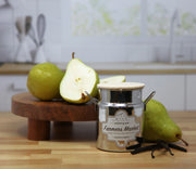 Silver canister labeled 'Farmers Market' on a wooden surface with pears and vanilla beans.
