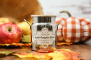 Jar of Apple Pumpkin Butter with autumn-themed background