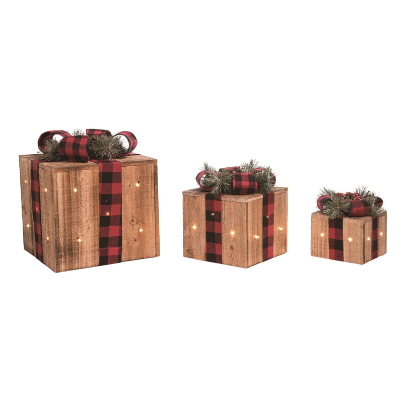 Set of three wooden gift boxes with plaid ribbons and lights on a white background