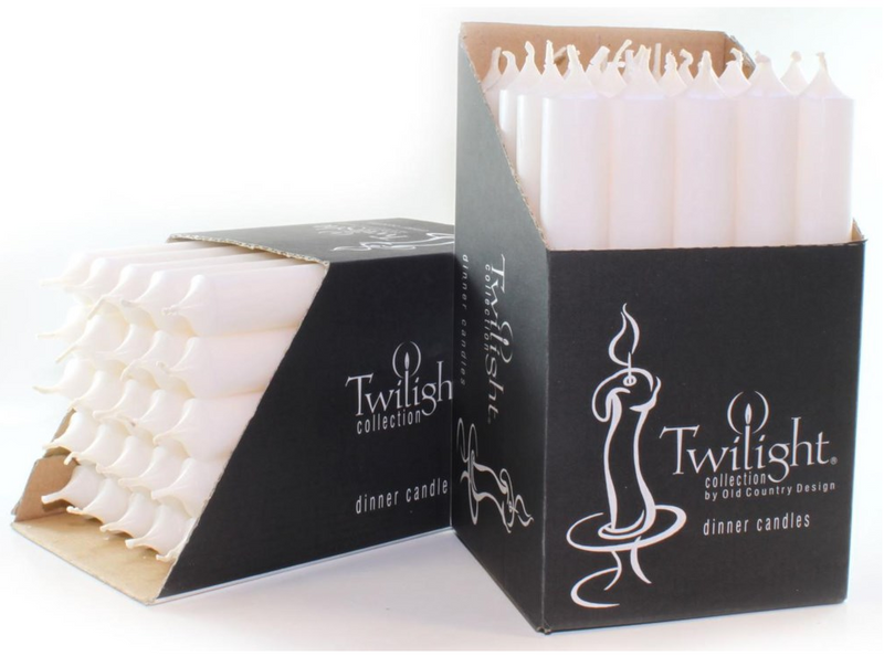 Twilight collection dinner candles in open packaging on a white background