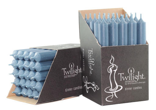 Blue candles in a Twilight collection packaging on a white background