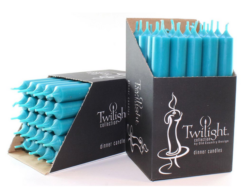 Blue candles in a Twilight collection box on a white background