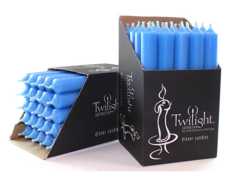 Blue candles in black Twilight packaging on a white background