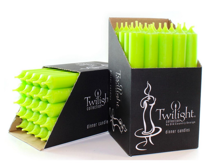Green candles in a Twilight collection box on a white background