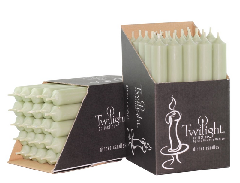 Packaging of Twilight dinner candles with stacked candles on a white background