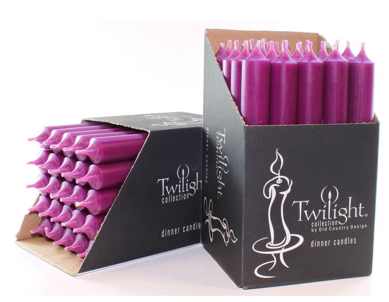 Purple candles in a Twilight collection box on a white background