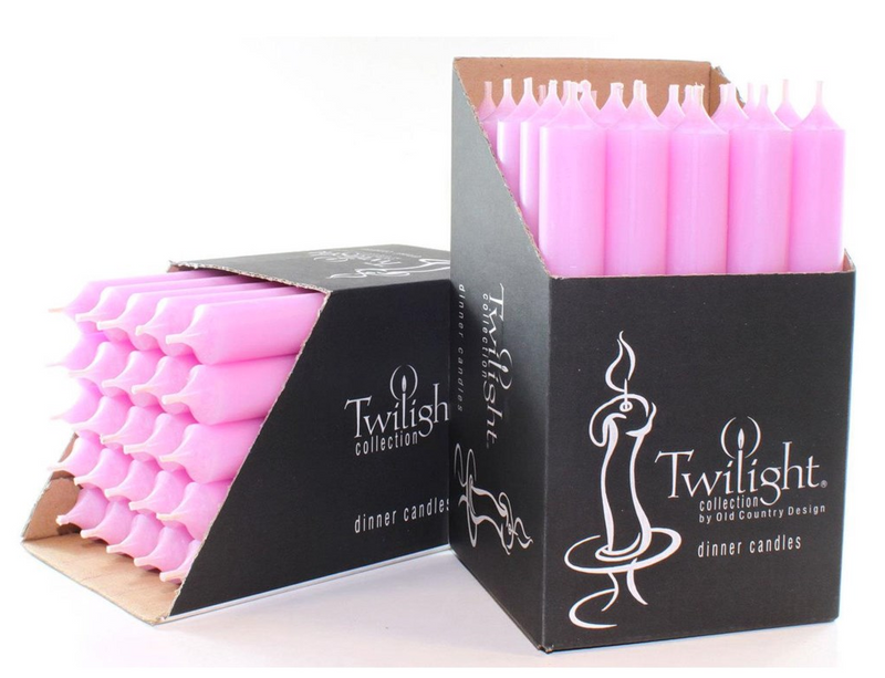 Pink candles in a Twilight collection box on a white background