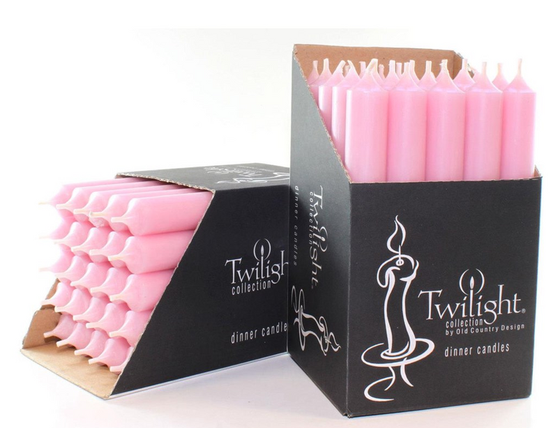 Pink candles in a Twilight collection box on a white background