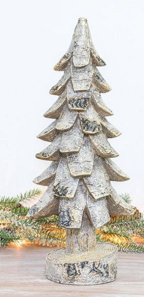 Decorative Christmas tree sculpture on a wooden base with a white background