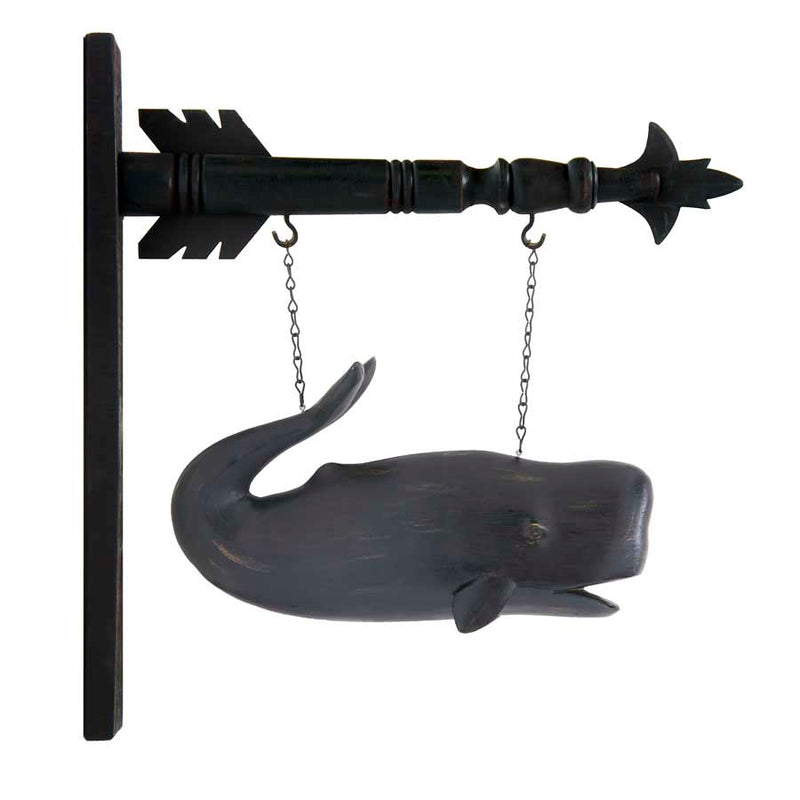 Decorative wall hook with a whale design on a white background