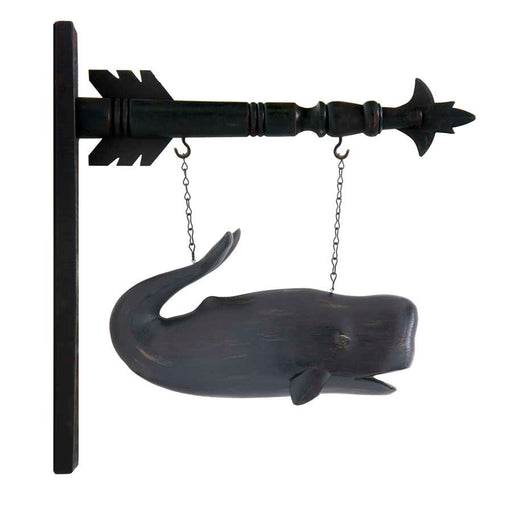 Decorative wall hook with a whale design on a white background
