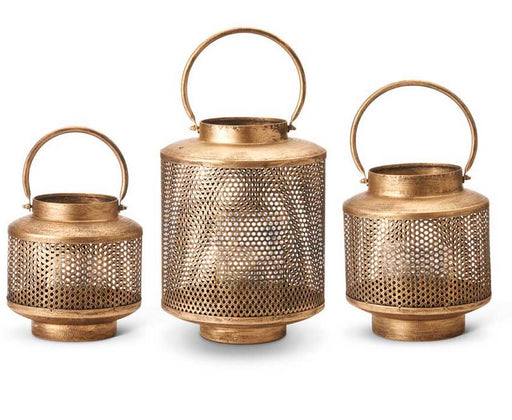 Three gold lanterns with mesh designs on a white background