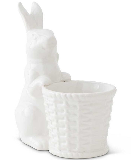 White ceramic planter shaped like a llama on a white background