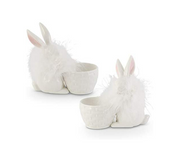 Two white ceramic bunny-shaped planters on a white background