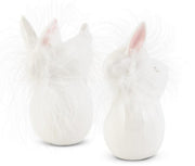 Two white ceramic rabbit-shaped vases on a white background