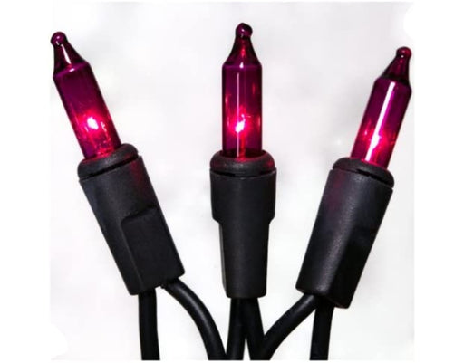 Three red Christmas lights with black connectors on a white background