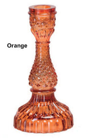 A collection of Bella Candle Holders in various colors. These vintage-inspired glass holders have a pressed and lacquered design, standing 4 inches wide by 8.