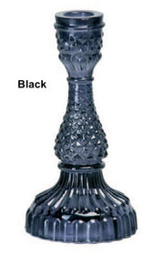 A collection of Bella Candle Holders in various colors. These vintage-inspired glass holders have a pressed and lacquered design, standing 4 inches wide by 8.