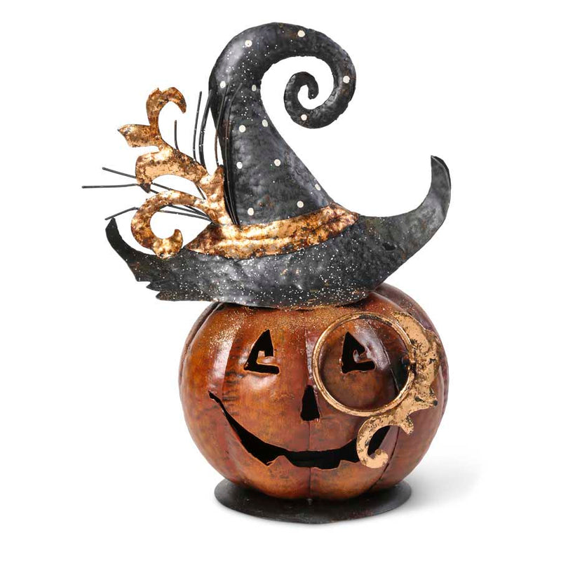 Decorative pumpkin with a witch hat on a white background