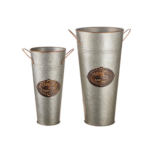 Two metal flowerpots with 'Flowers & Gardens' branding on a white background